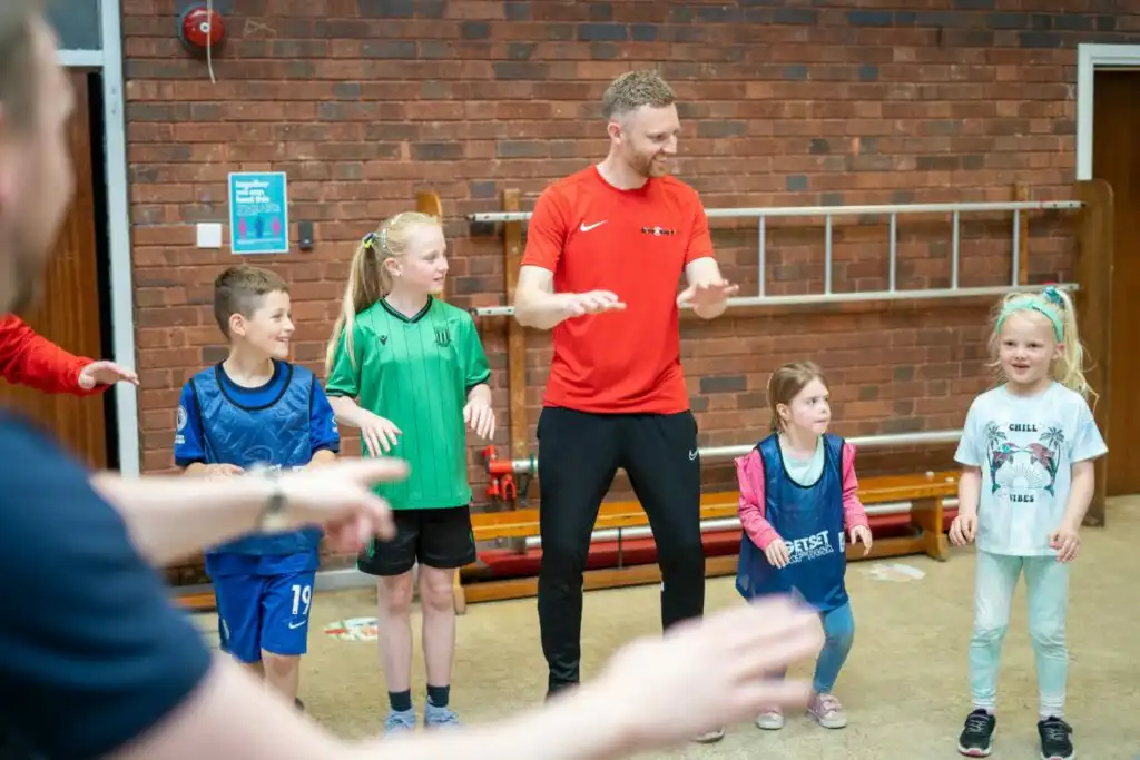 time4sport educator playing game with children