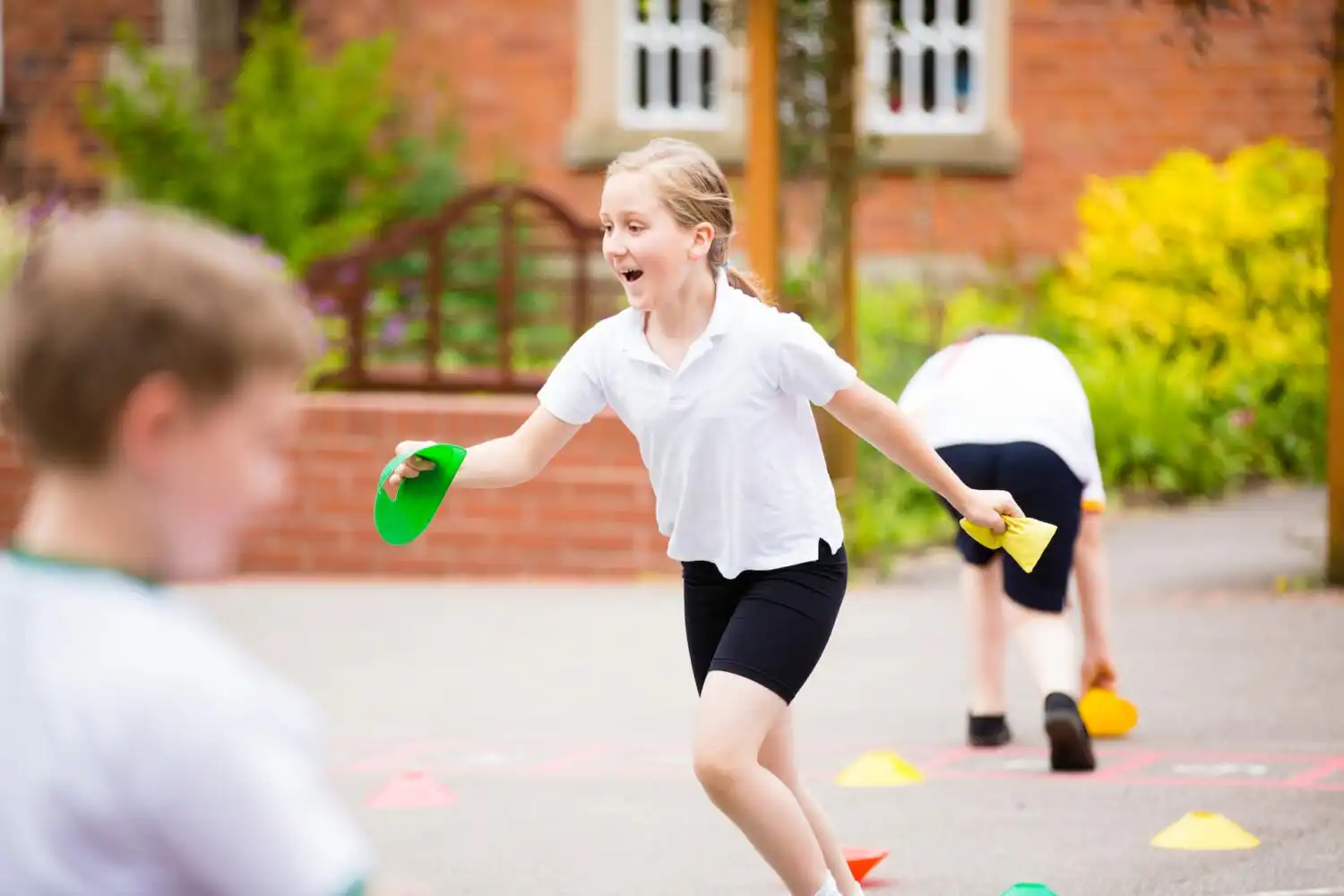 maths on the move children running with bean bags
