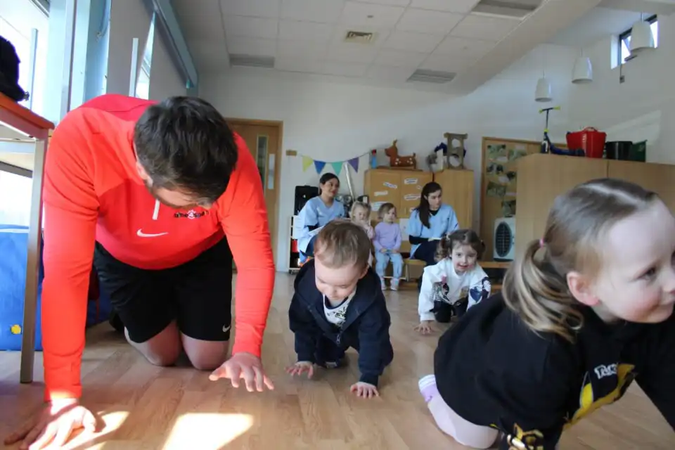 children crawling with time4toddlers staff